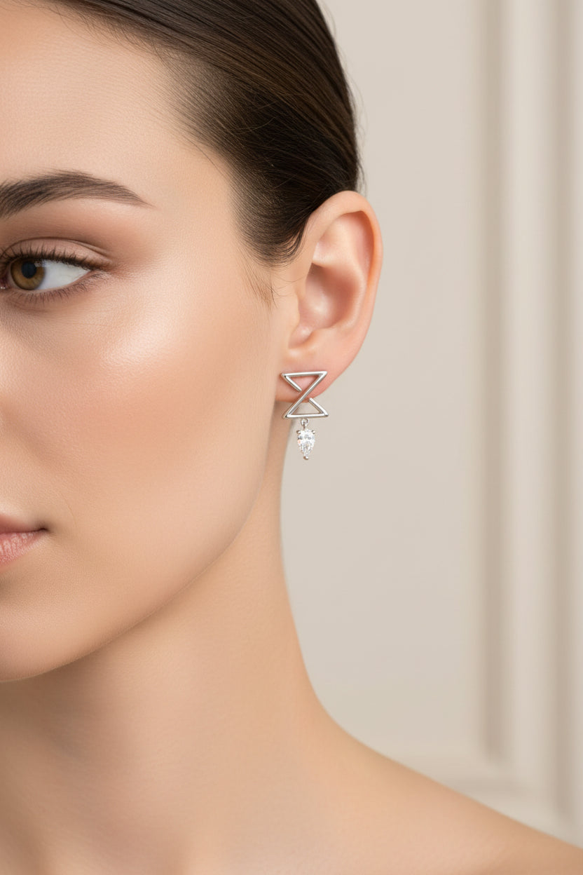 Infinity Single Ear Stud In White Gold With Pear Diamonds