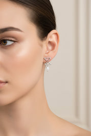 Infinity Single Ear Stud In White Gold With Pear Diamonds