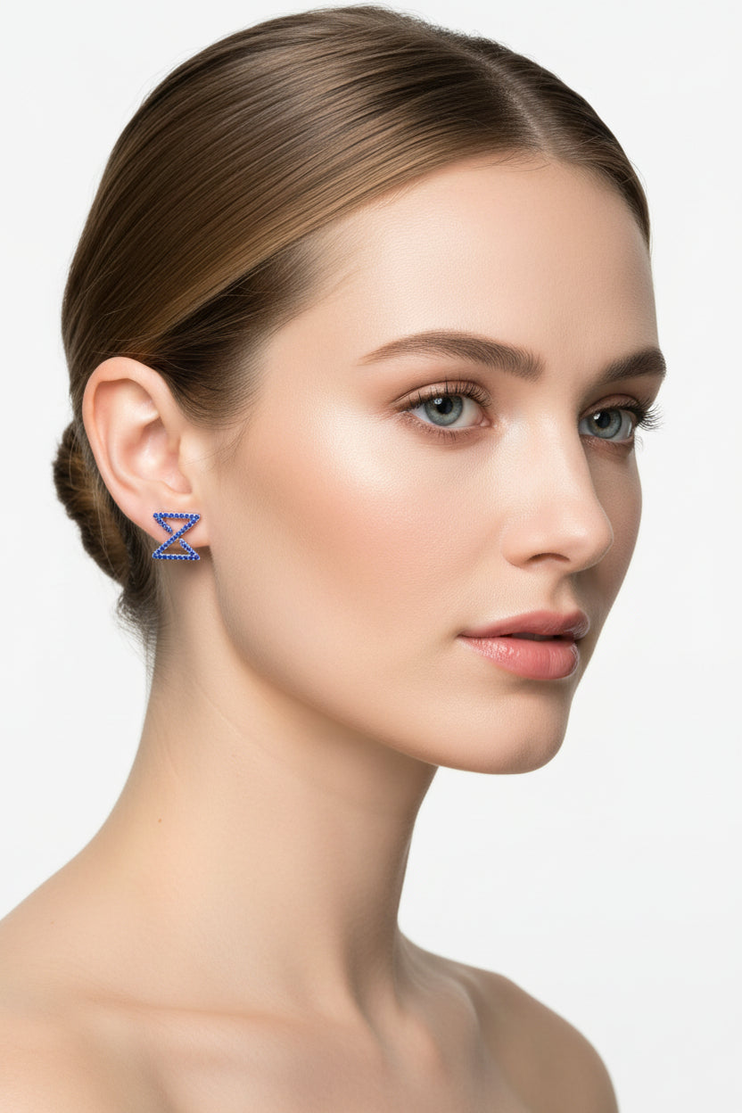 Infinity Ear Studs In White Gold With Sapphire