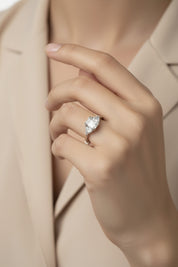Emerald-cut & Triangular-Shaped Diamond Ring